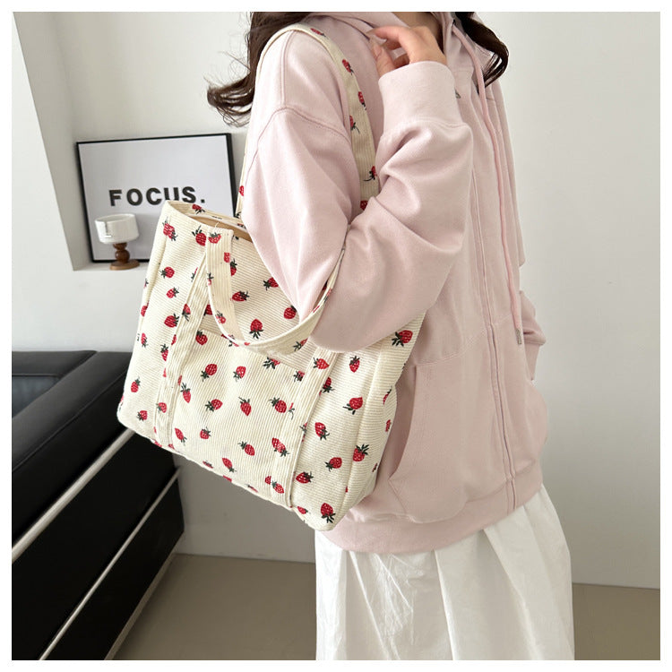 Bolso de pana con diseño de fresas, bolso de playa, moderno y versátil, bolso de hombro de gran capacidad, bolso de mano sencillo para mujer.